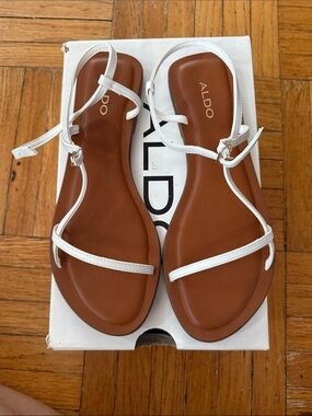 ALDO White Strappy Flat Sandals with Brown Footbed